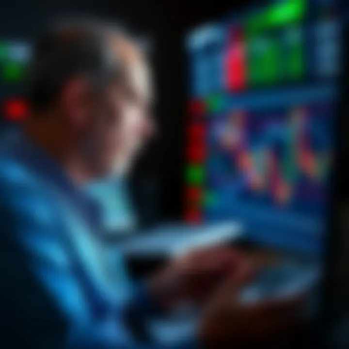 Bill Lipschutz analyzing financial charts on a computer screen